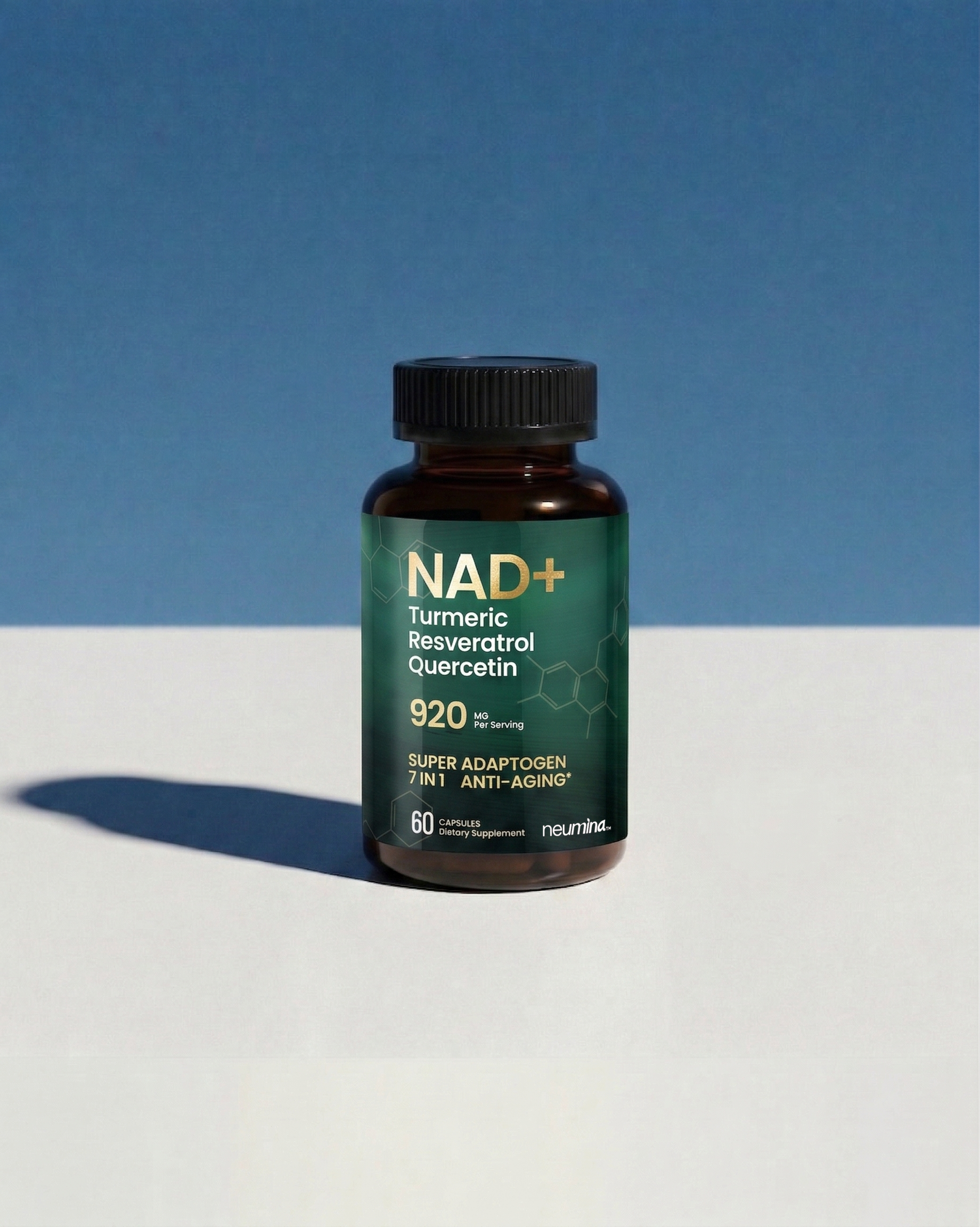 Authentic studio shot of Neumina NAD+ Complex bottle on a clean white surface with natural shadows. Labels verify: 920mg per serving, 7-in-1 Anti-Aging formula with Resveratrol, Quercetin, and Super Adaptogens. 60 capsules (30-day supply). Focus: premium packaging quality and ingredient transparency for professional-grade cellular health supplements.