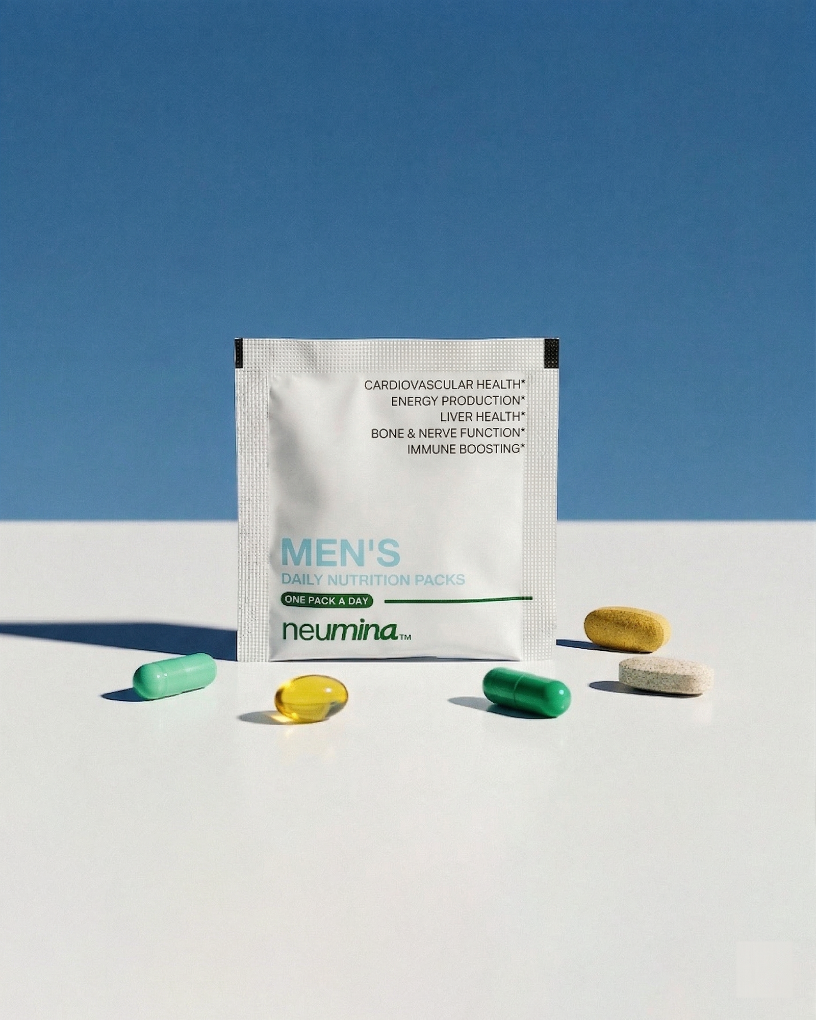 Product shot of Neumina Men's Daily Nutrition Packs, featuring a 30-day supply in a premium olive green box with a portable daily sachet. The formula contains 29 essential nutrients targeting Cardiovascular Health, Energy Production, Liver Health, Bone & Nerve Function, and Immune Boosting. Key ingredients include Ashwagandha, Oyster Extract, Milk Thistle, and Fish Oil. Designed for busy professionals and athletes seeking convenient, science-backed male wellness.